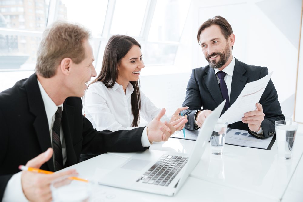 Advisors meeting with a client